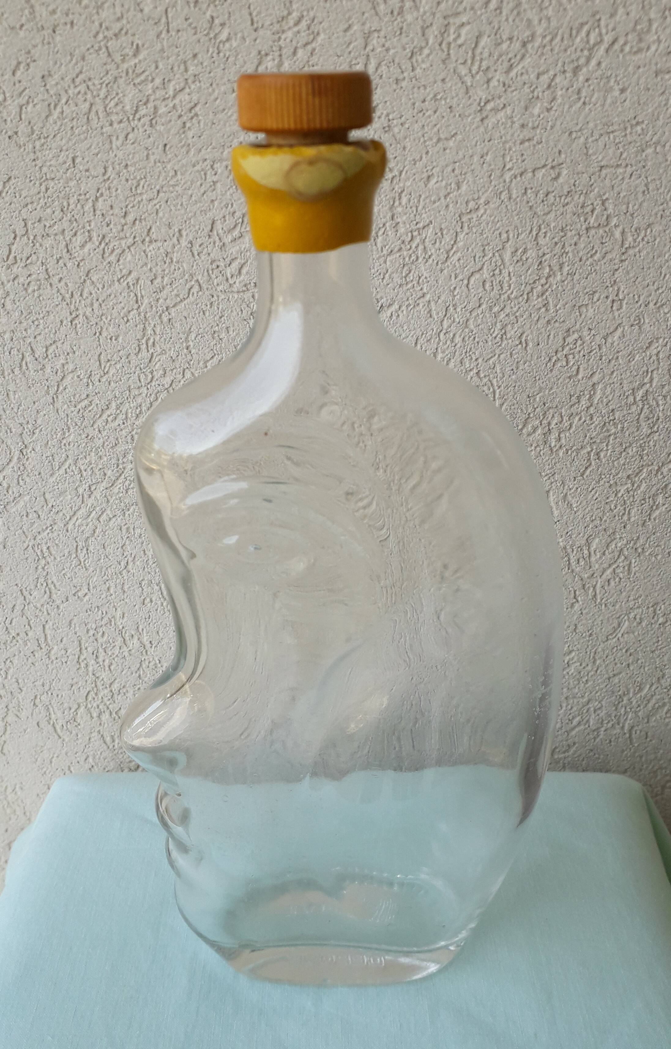 Bouteille anthropomorphe en verre