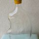 Bouteille anthropomorphe en verre