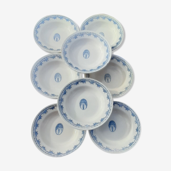 8 hollow plates in F J earthenware with frieze and central bouquet