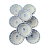 8 hollow plates in F J earthenware with frieze and central bouquet