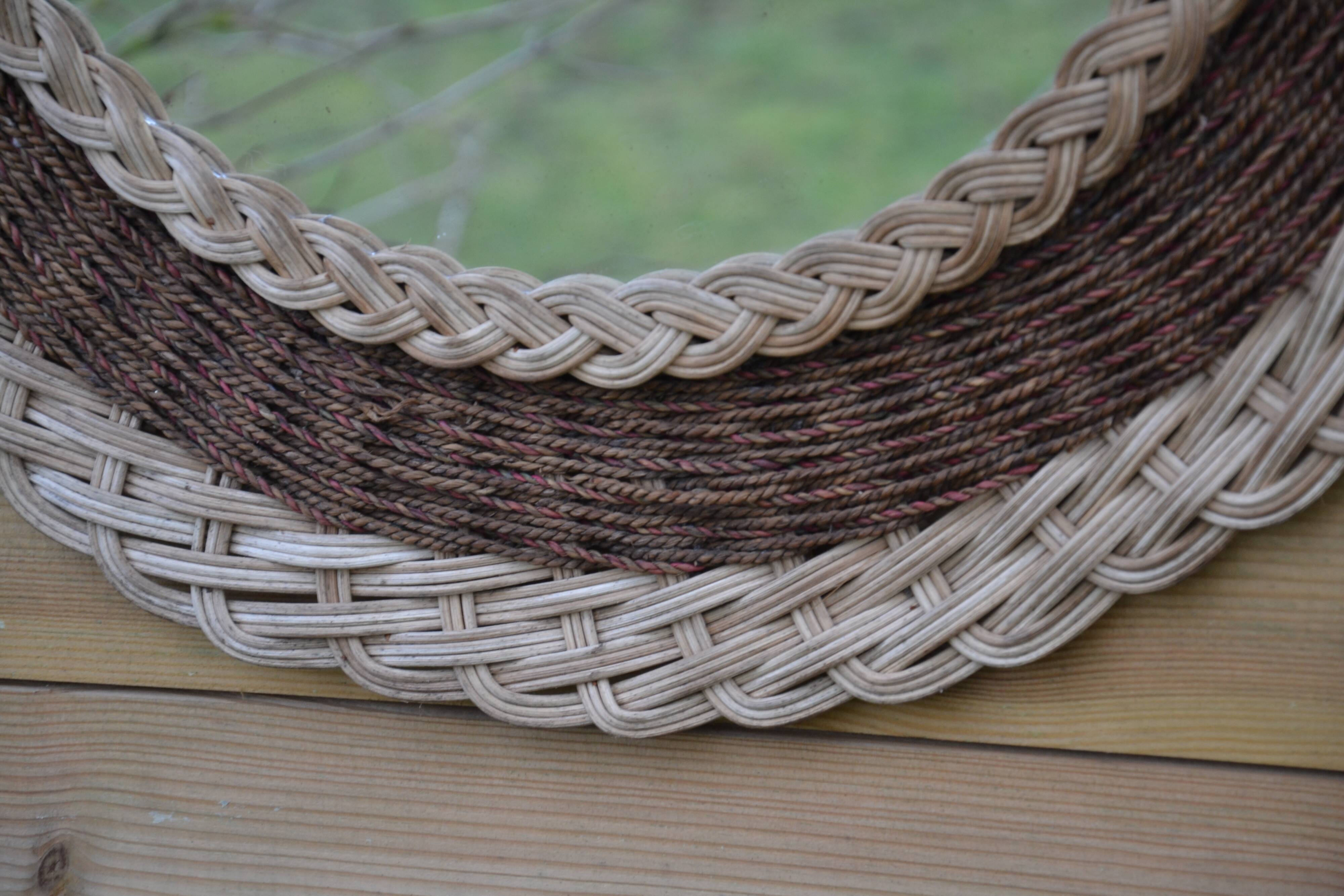 Round woven rattan mirror with rope from the 1970s.
