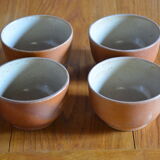 Lot of 4 bowls in sandstone and shiny grey inside