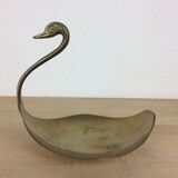 Empty golden brass swan pocket