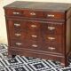 Walnut chest of drawers, black marble top