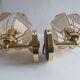Pair of vintage brass wall sconces with glass shades