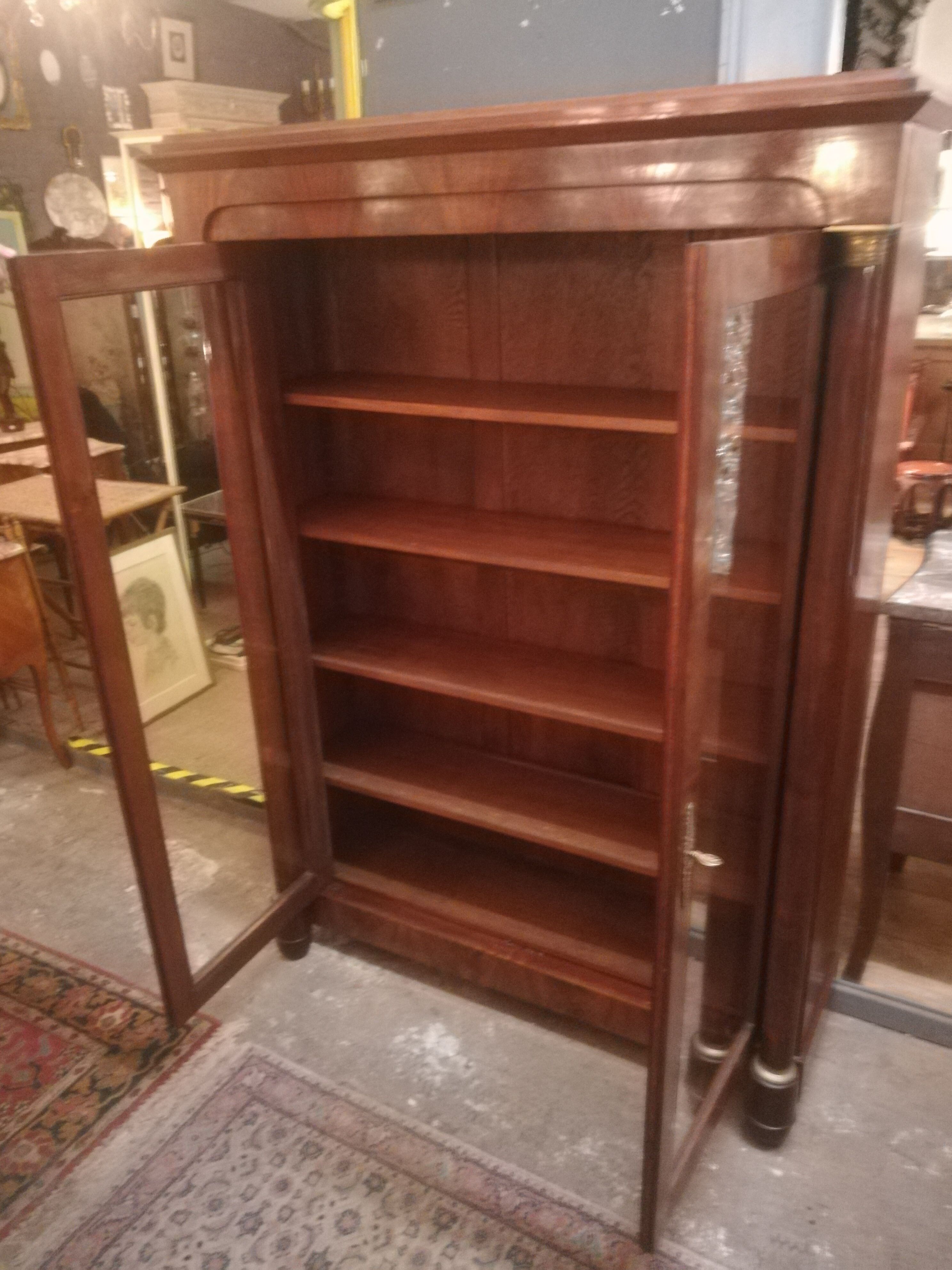 Empire style library in mahogany and bronze