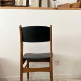 Scandinavian chair in wood and black imitation leather