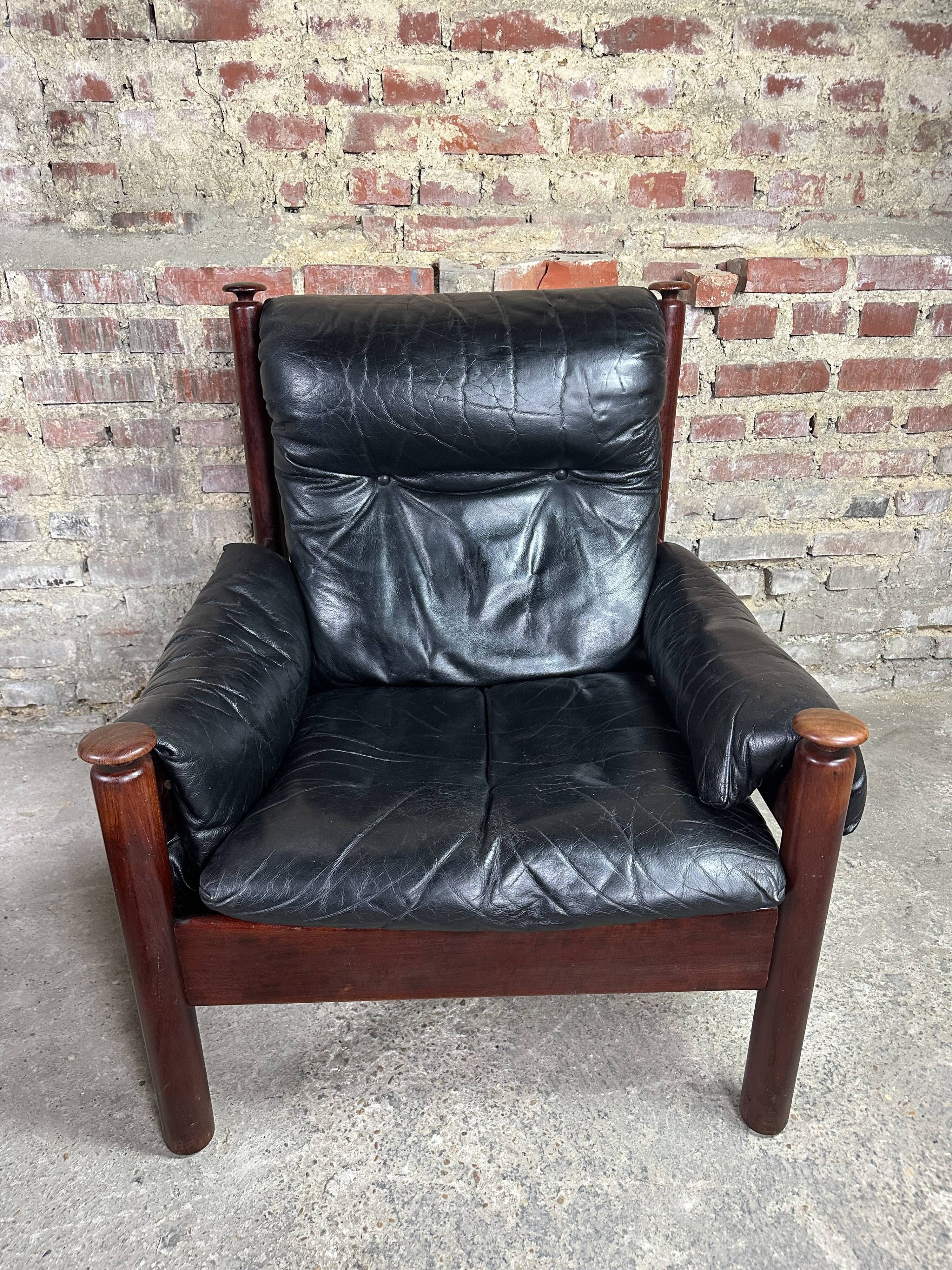 Admiral armchair and its ottoman by Erik Merthen Sweden vintage 1960