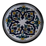 Round ceramic plate with hand-painted decoration