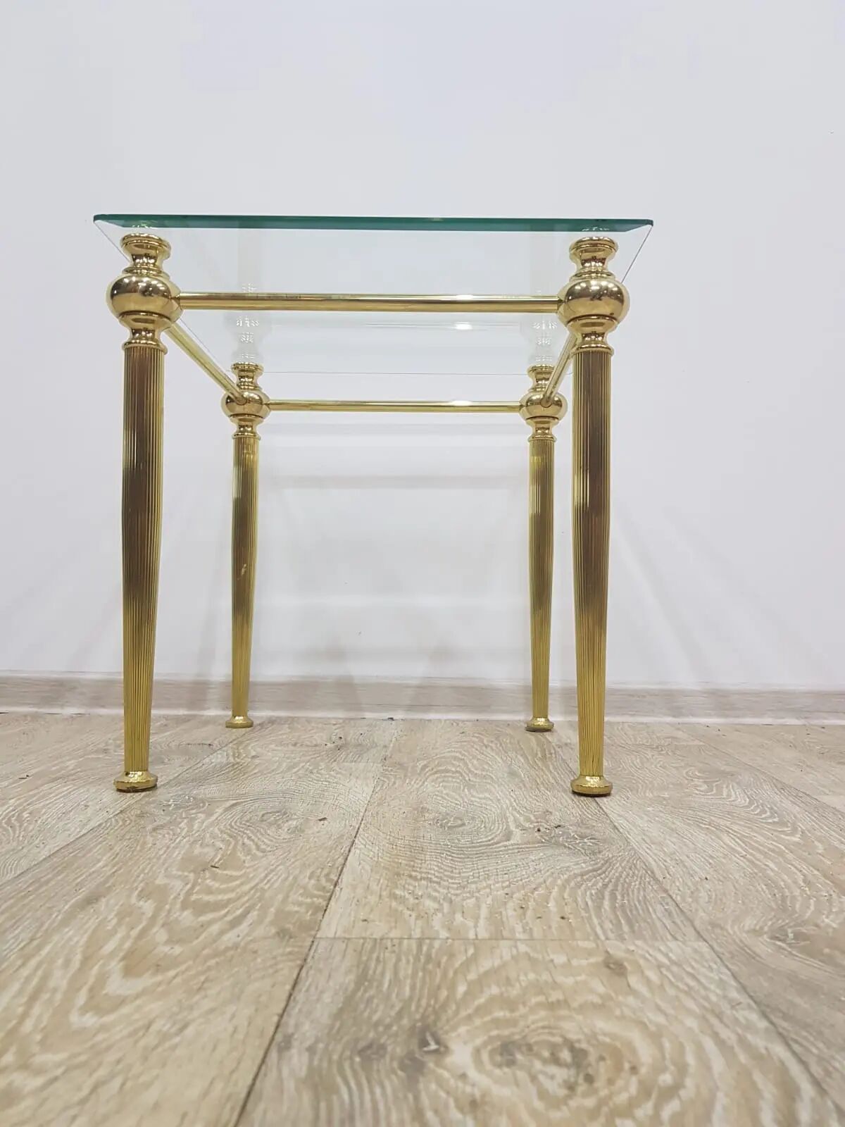 Side table, gold-tone brass, clear glass, France, 1960s.
