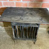 Antique writing desk, blackened wooden filing cabinet.