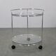 Mid-century round serving table, chrome and glass, Italy, 1980s