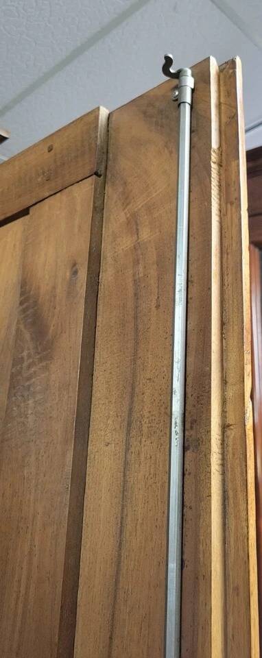 Exceptional Empire period wardrobe in solid walnut, 19th century, circa 1800