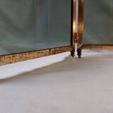 Vintage fireplace screen in smoked glass and gold-tone metal