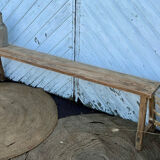 Old farmhouse bench in raw solid wood