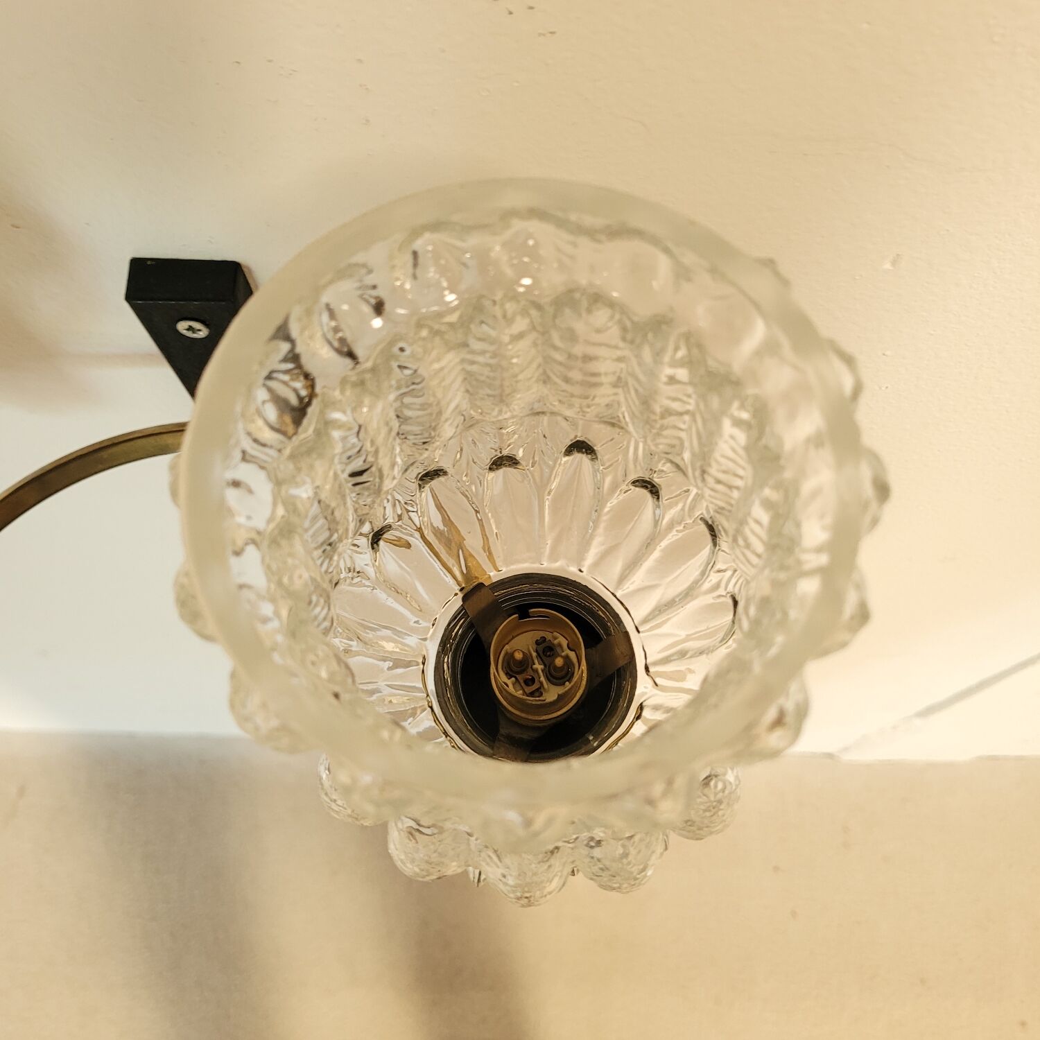 Vintage Arlus wall lights in glass and brass from the 1970s.