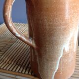 Pitcher in water in sandstone