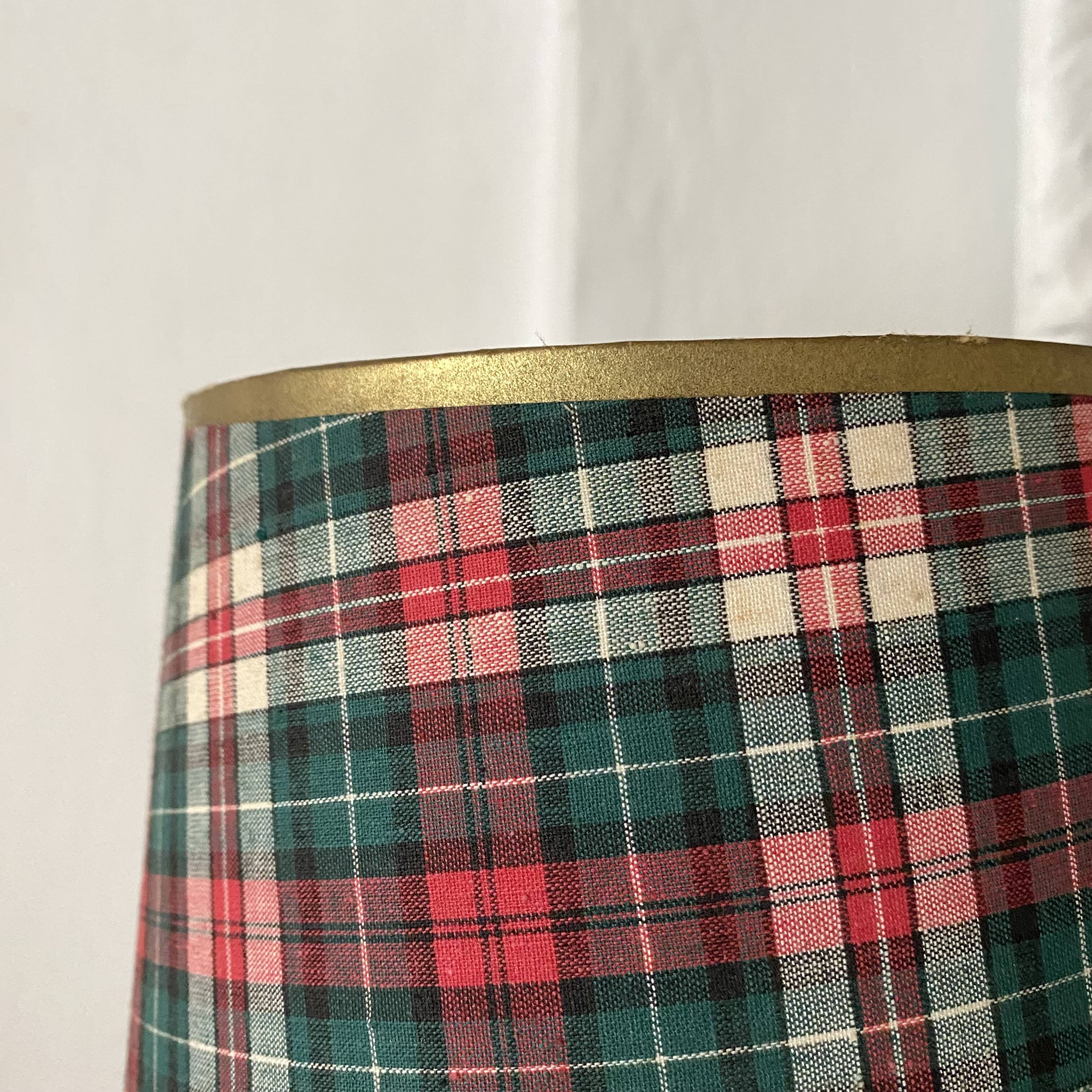 Turned wooden lamp, tartan lampshade.
