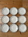 Set of 9 antique flat plates