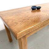 Solid oak farmhouse table, square legs.