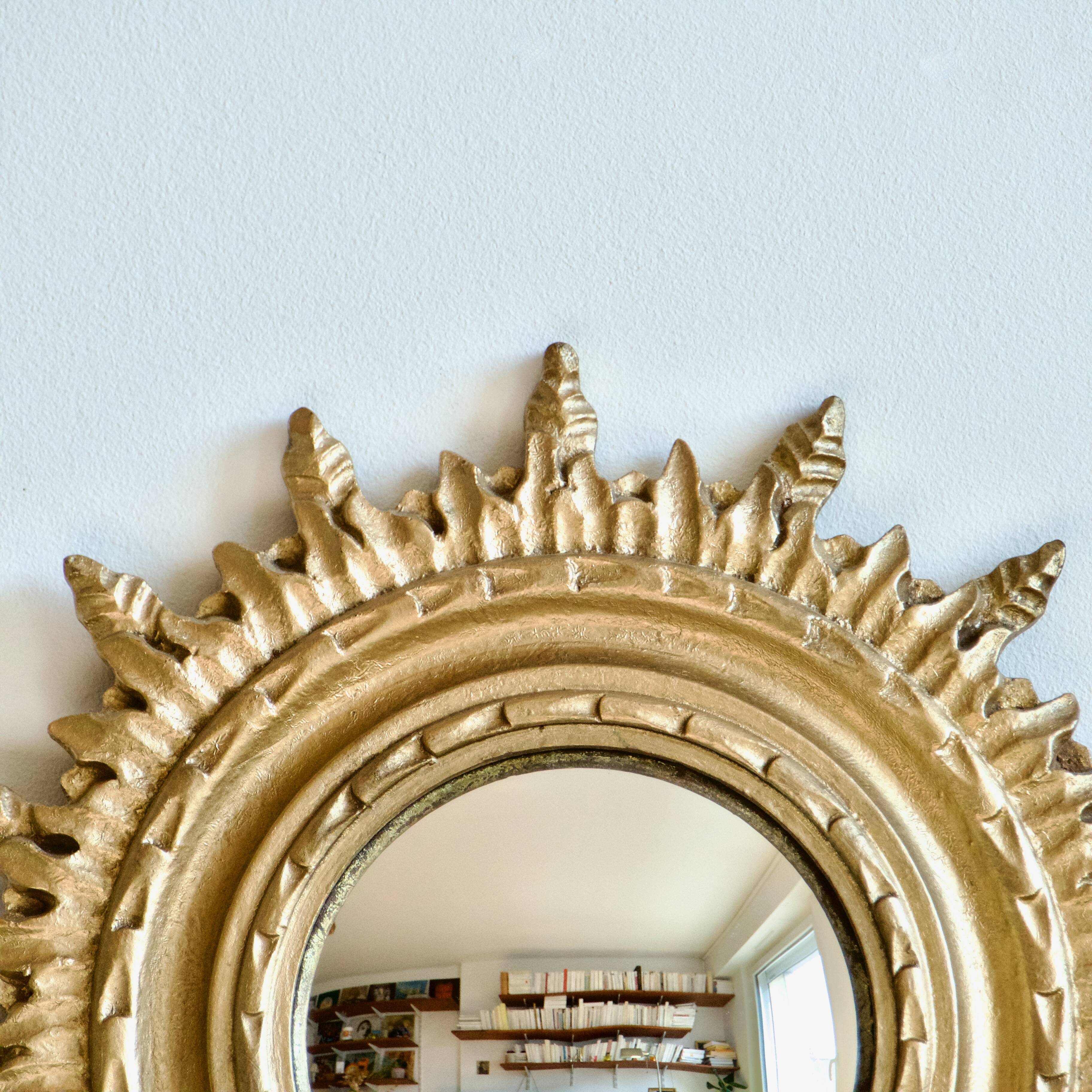 Ancien miroir doré oeil de sorcière soleil