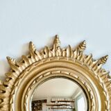 Antique golden witch's eye sun mirror