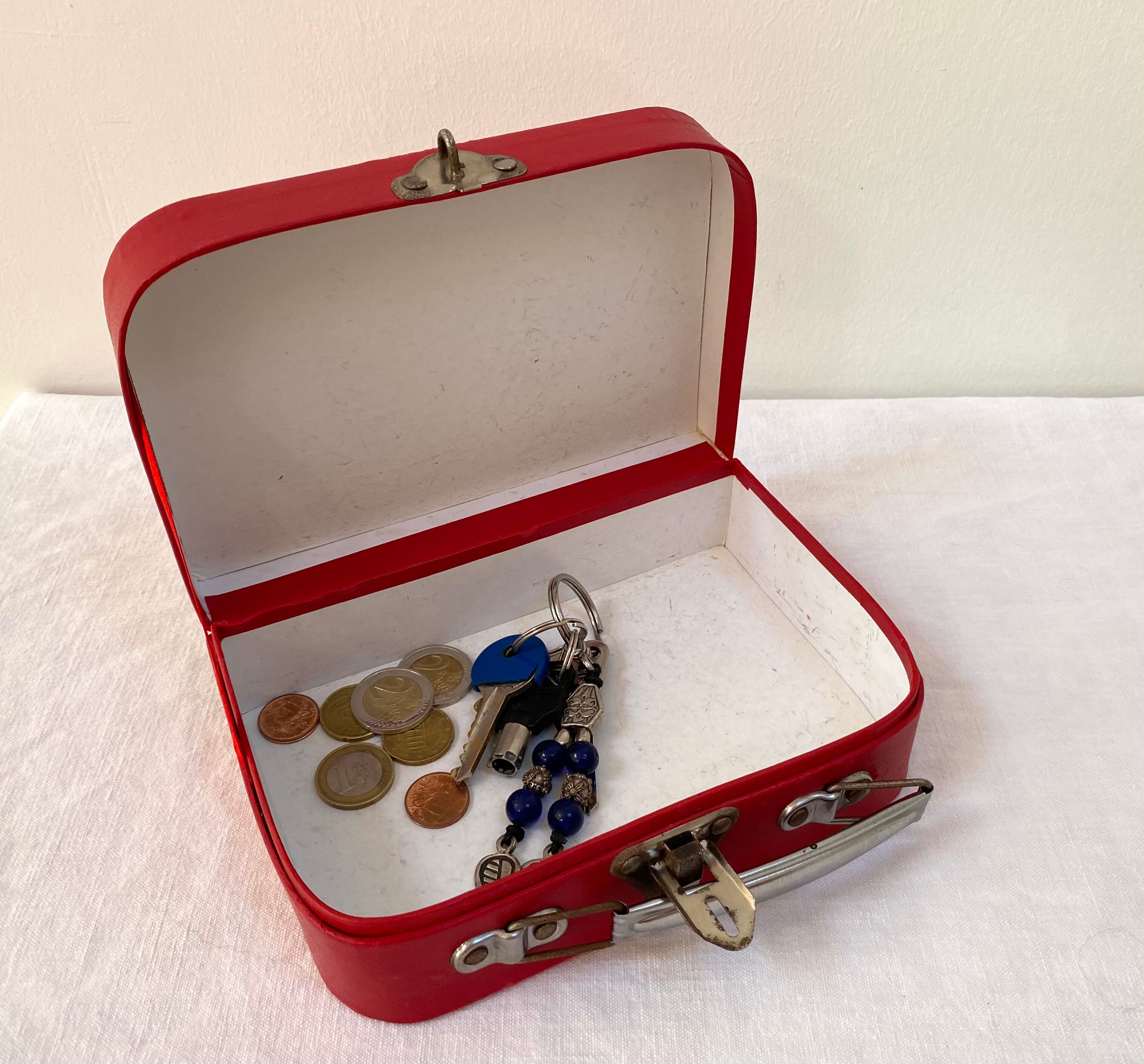 Red suitcase from the 60s