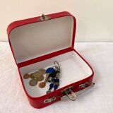 Red suitcase from the 60s