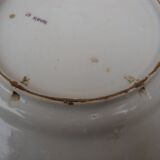 Old earthenware plate decorated with a character marked Le HAVRE