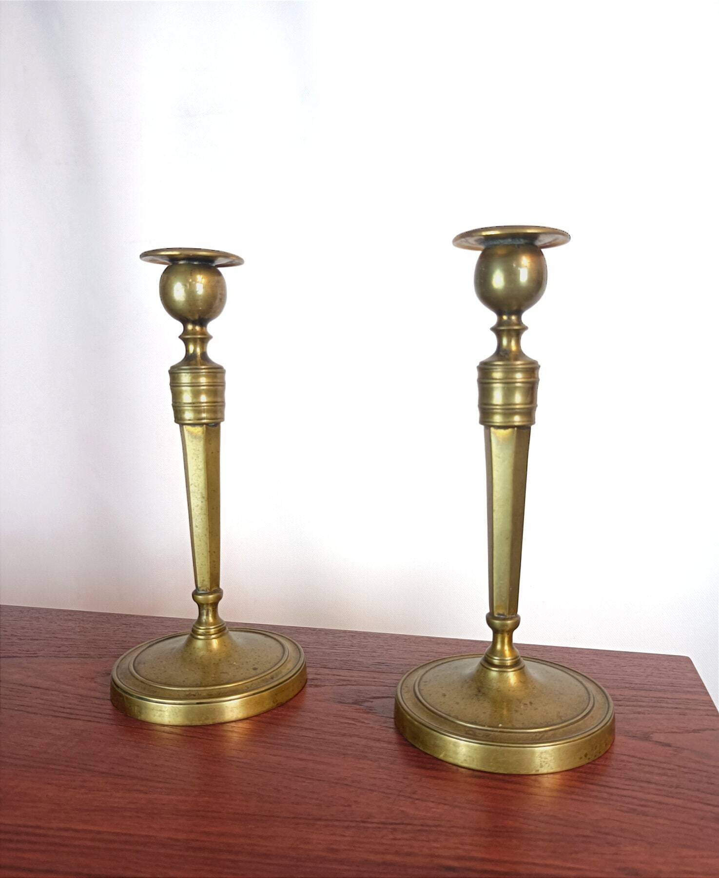 Pair of brass candlesticks, 19th century, neoclassical style.