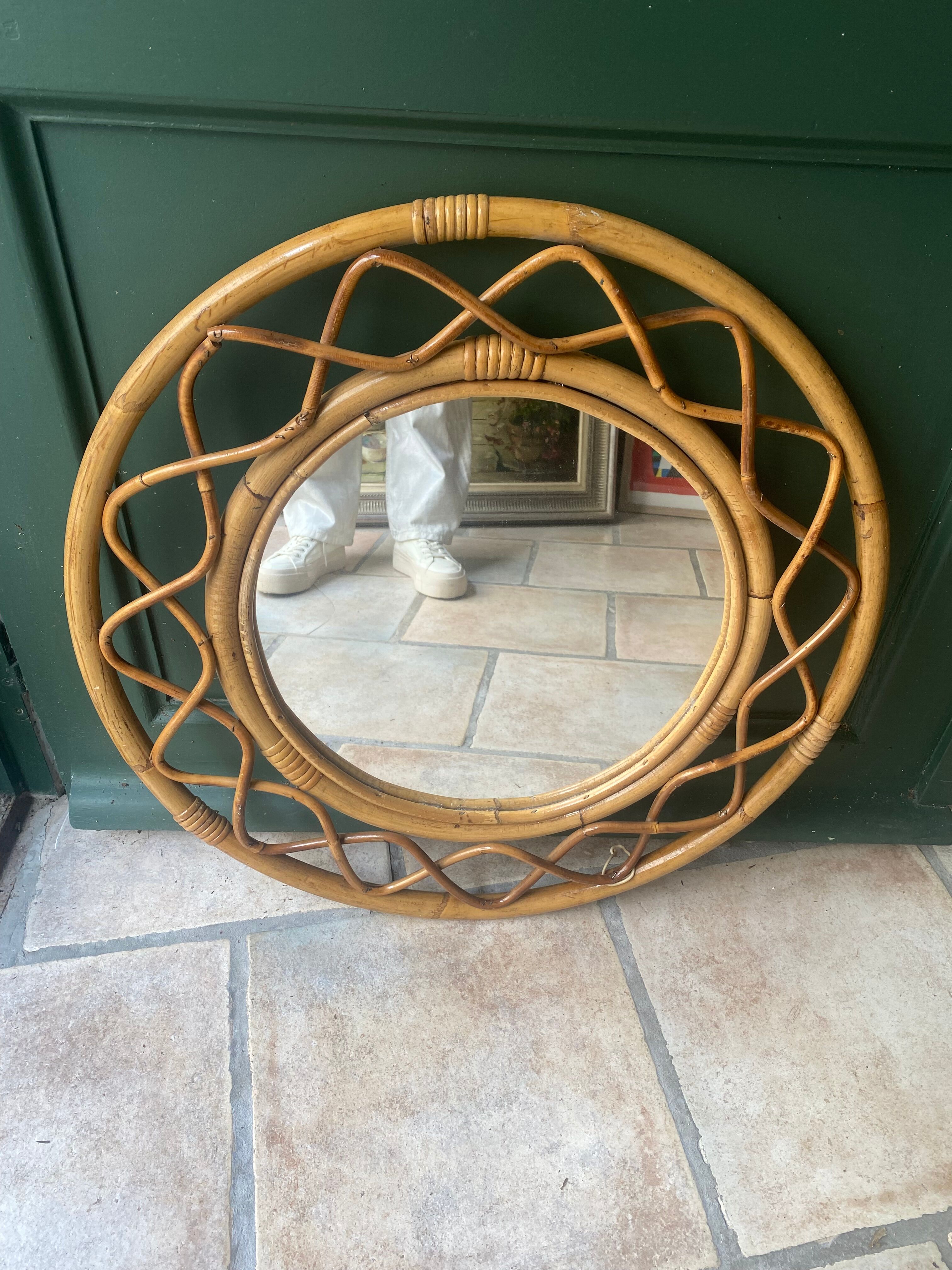 Round vintage rattan mirror