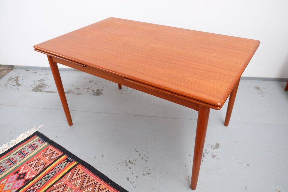 Teak dining table in retro vintage Danish style from the 60s-70s.