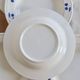 4 vintage deep plates in ivory earthenware with blue cherries