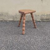 Turned wooden tripod stool