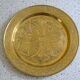 Oriental style chiseled metal plate
