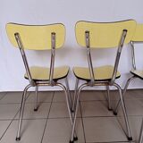 4 yellow Formica chairs