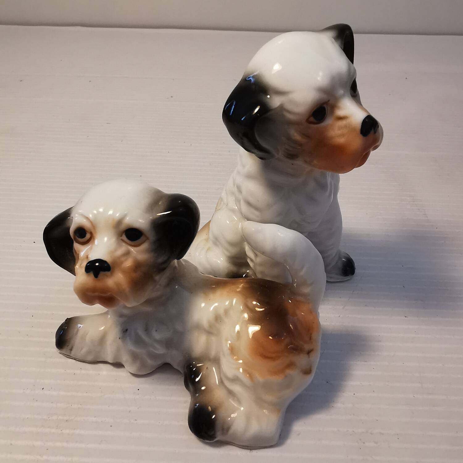Pair of vintage ceramic terrier puppy dog figurines