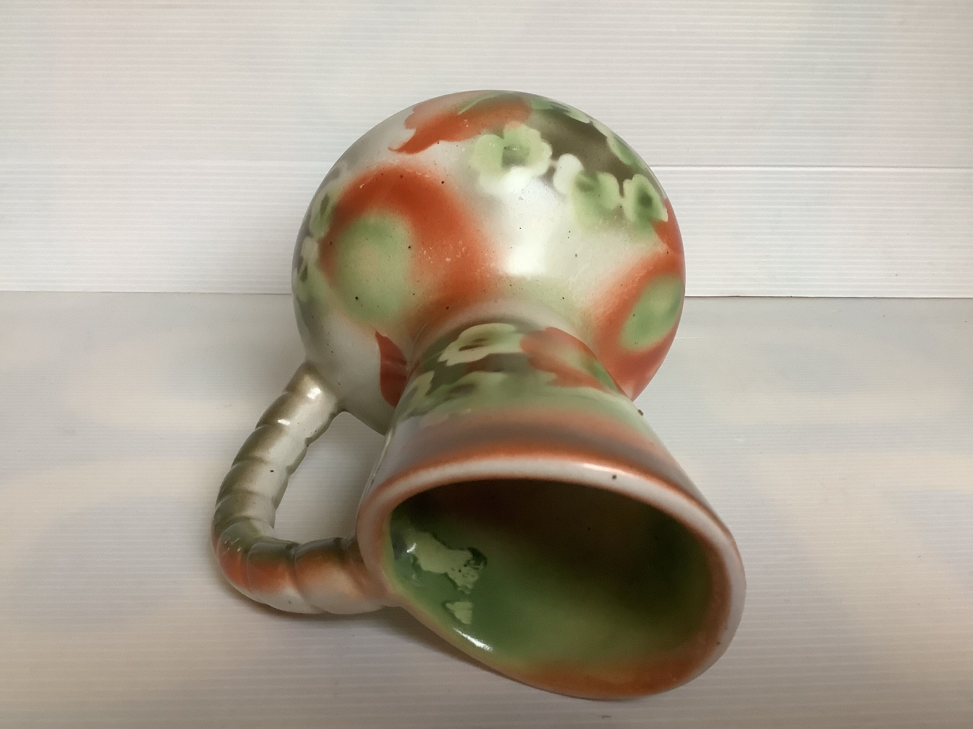 Old vase jug shape green and orange flowers