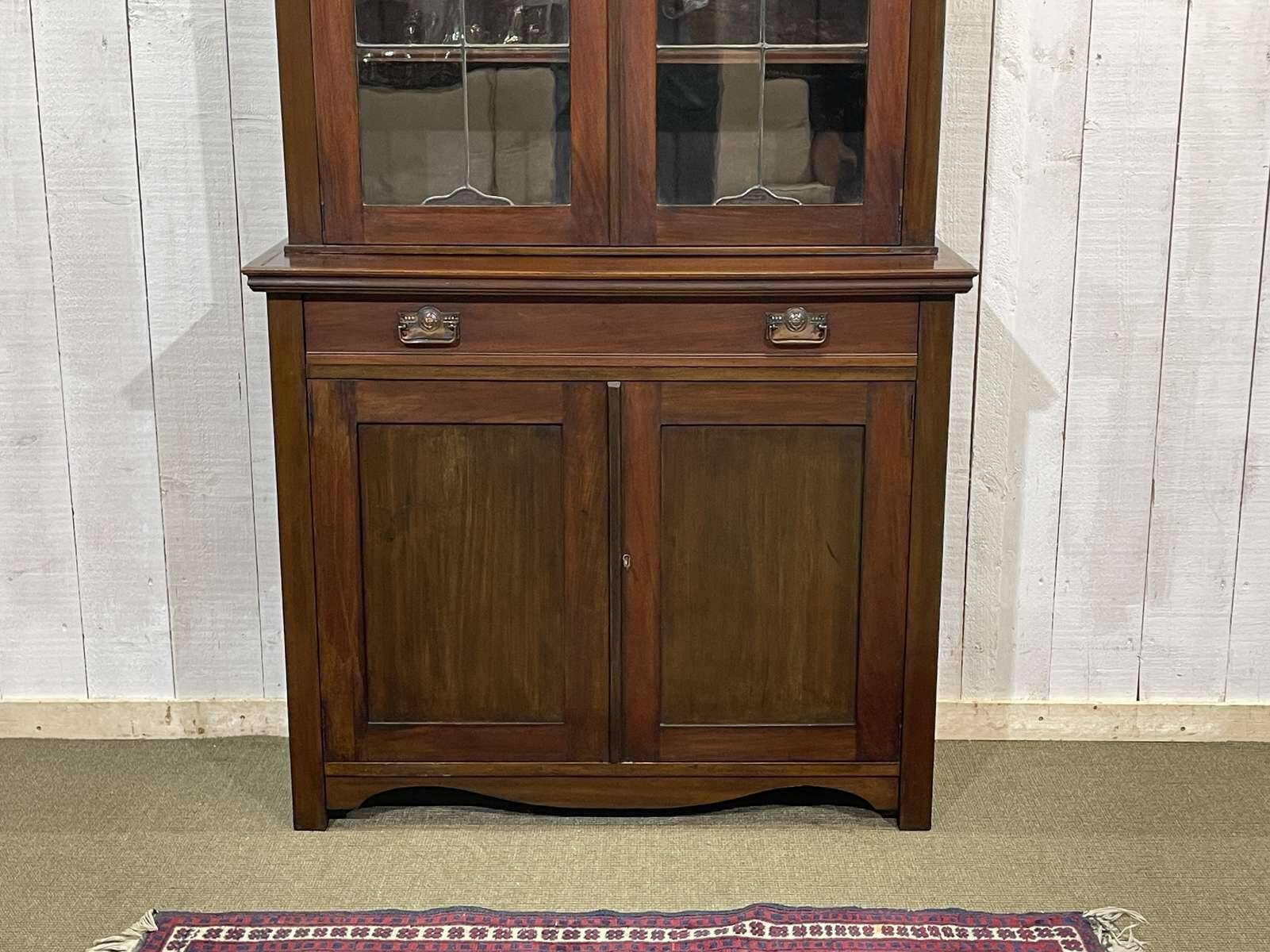 Early 20th century English two-section mahogany bookcase