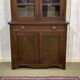 Early 20th century English two-section mahogany bookcase