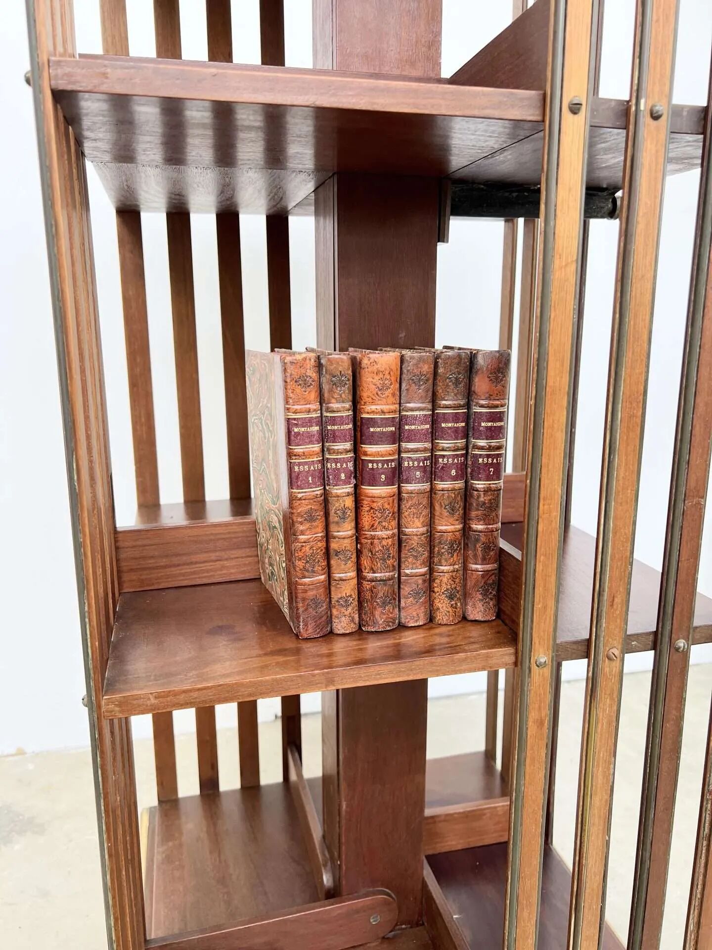 Rotating mahogany and brass library — G. Borgeaud, circa 1900