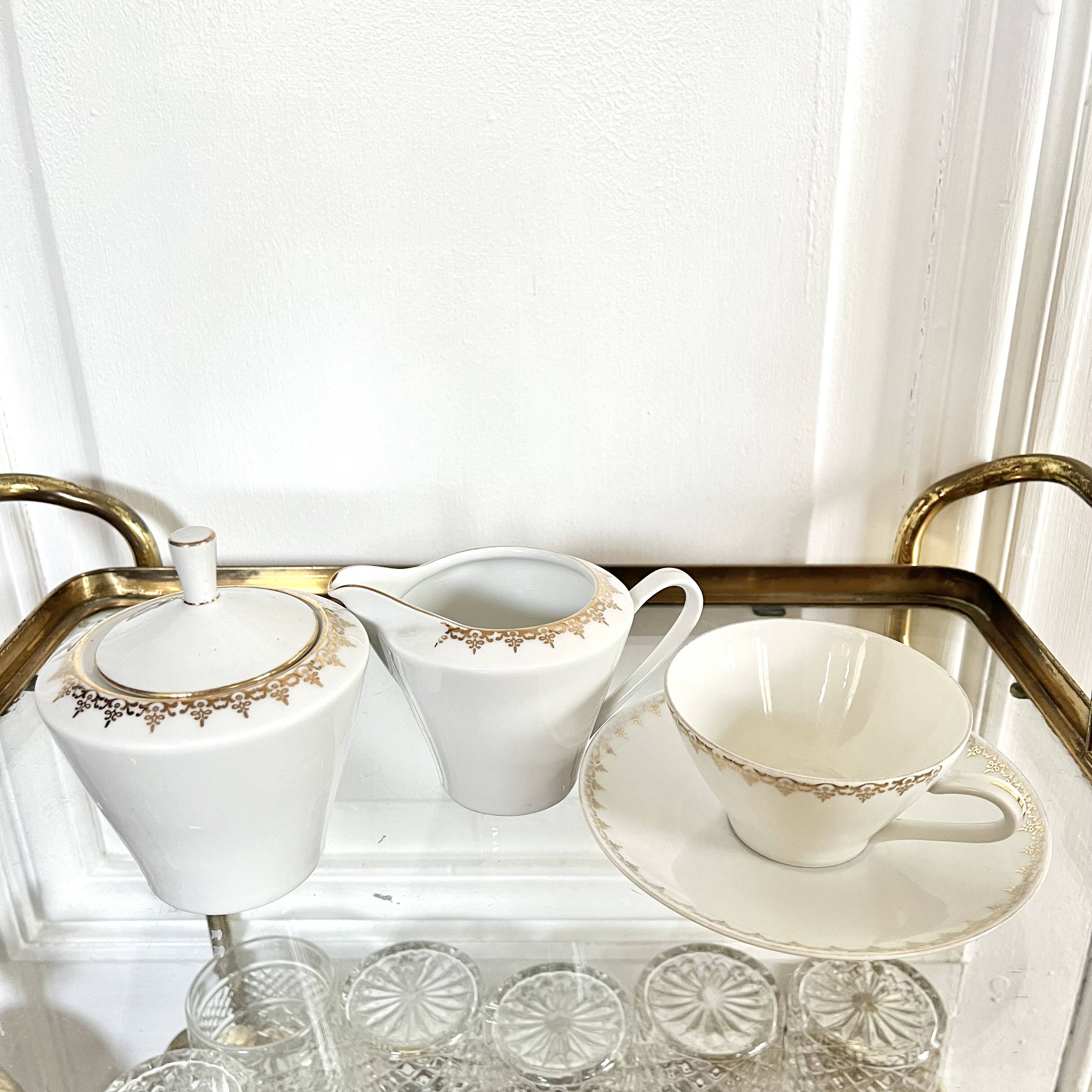 Porcelain sugar bowl and milk jug