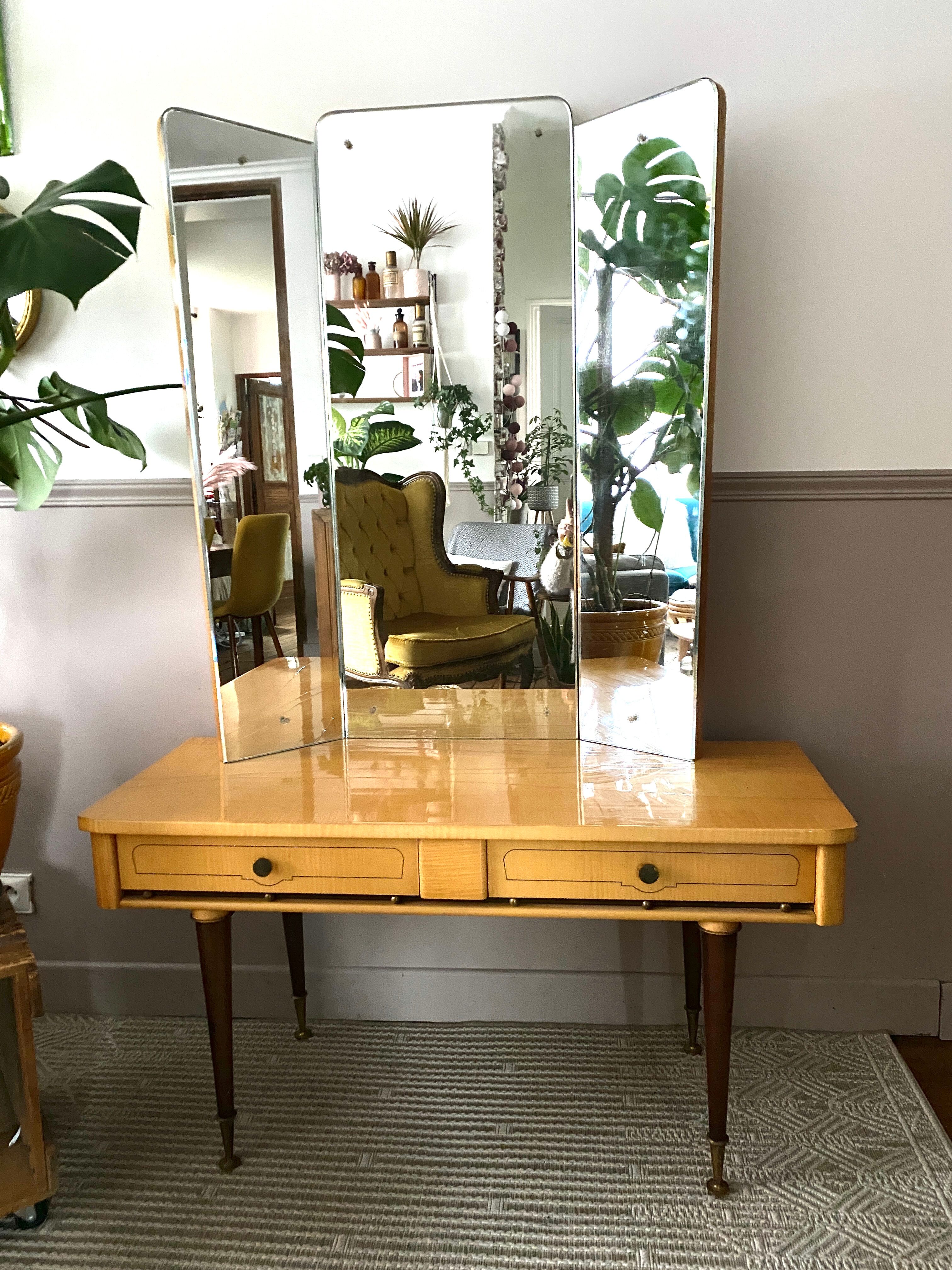 Dressing table in a vintage mirror triptych