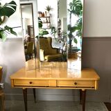 Dressing table in a vintage mirror triptych