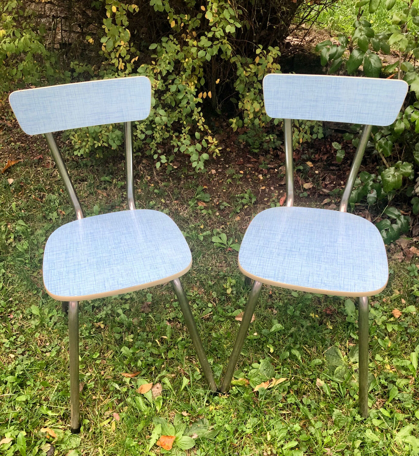 2 blue formica chairs