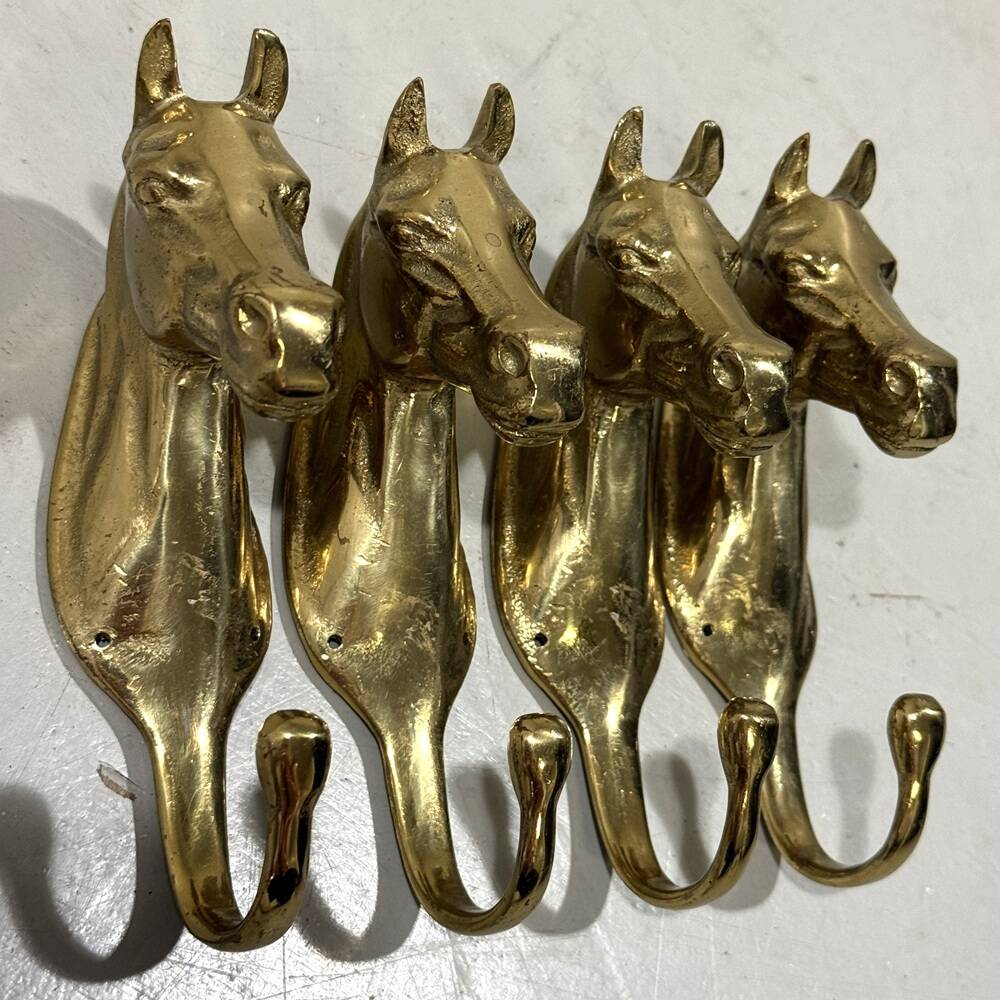 Brass horses coat hooks 1960’s, set of 4