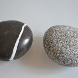 2 boxes in lithographed sheet metal in the shape of a pebble