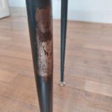 Small side table decorated with cigar rings under beveled glass