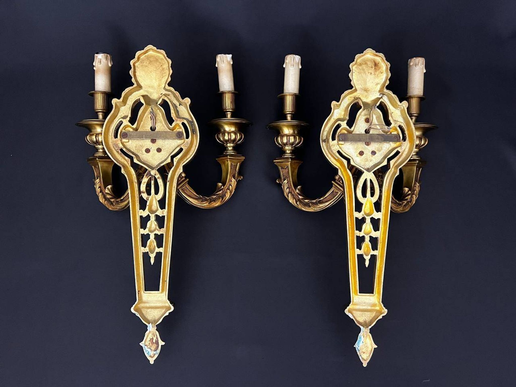 Large pair of gilt bronze wall sconces in the Louis XVI style.