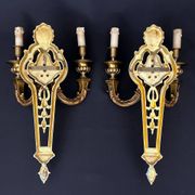 Large pair of gilt bronze wall sconces in the Louis XVI style.